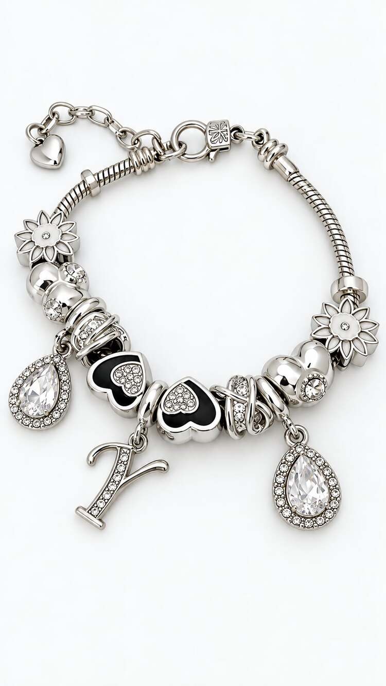 Silver Tone Charm Bracelet With Black Hearts And Crystals